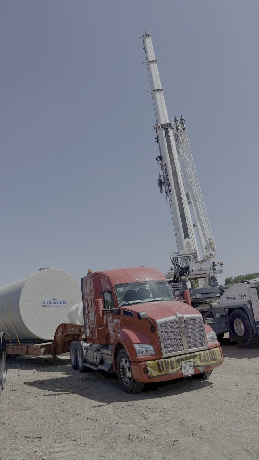 Stealth Tanks double-wall underground storage tank loaded on a trailer for delivery to a Houston, Texas job site